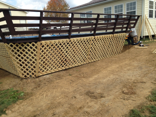 Custom lattice work around above ground swimming pool