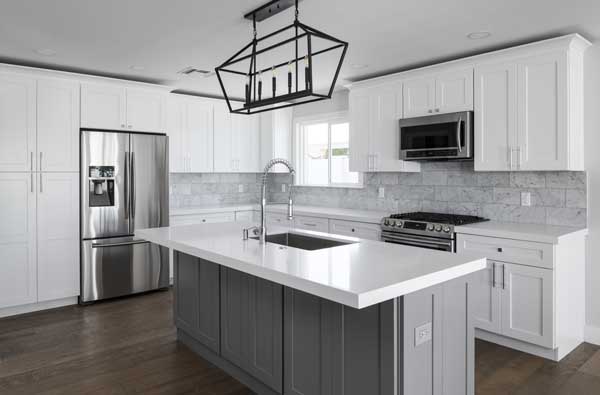 Color photo of a beautiful modern kitchen.